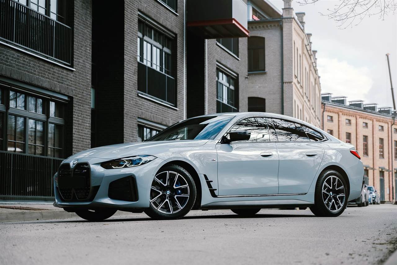 Grey BMW Gran Coupé parked on a city street